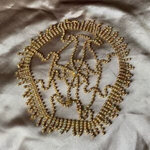 Gold rhinestone head jewelry